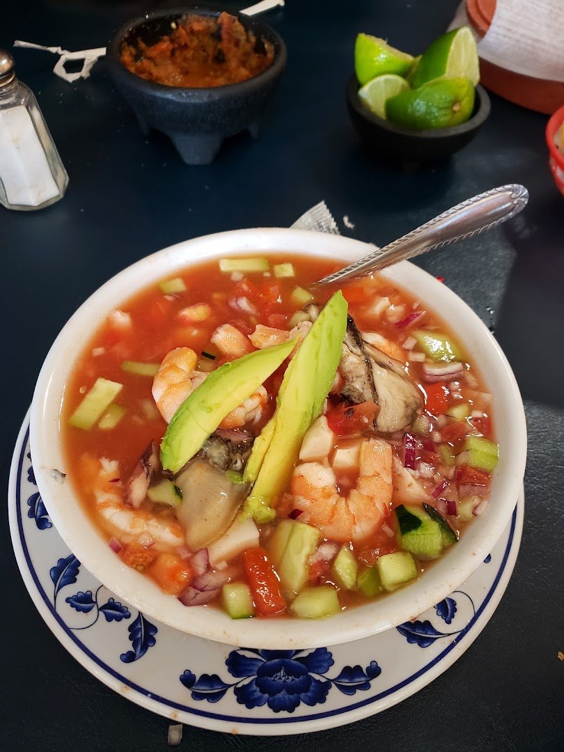 Seafood dishes served in a relaxed setting.